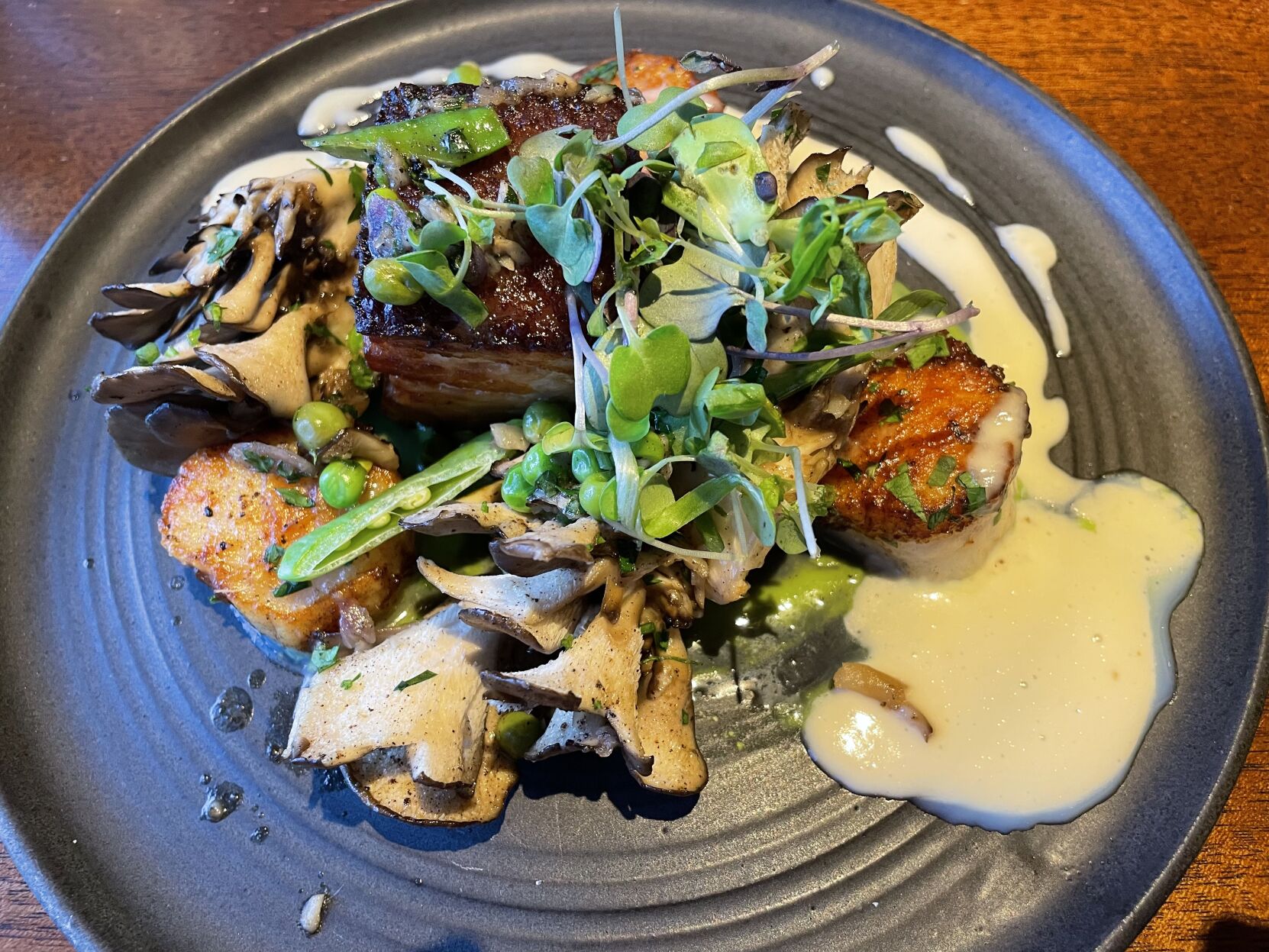 Scallops and pork belly dish